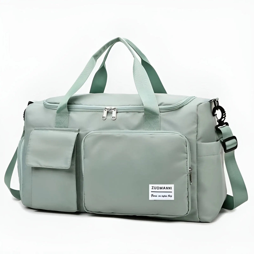 Durable unisex travel bag, large capacity, waterproof design, and integrated shoe compartment.