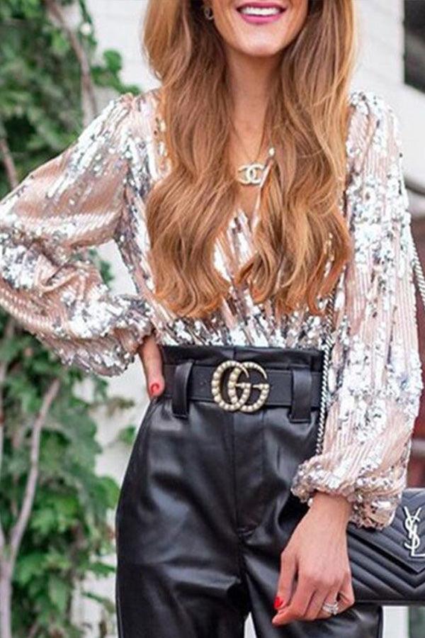 Festive women's sparkling long sleeve top. V-neck glitter shirt for parties, evening wear & special events.