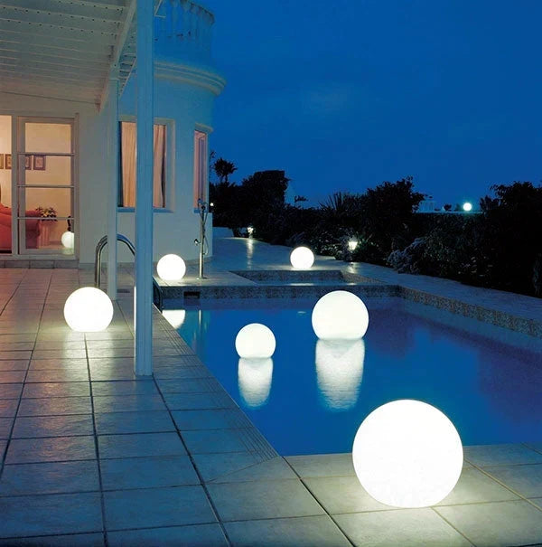 GlowSphere outdoor light, a versatile LED sphere, used as pathway lighting.