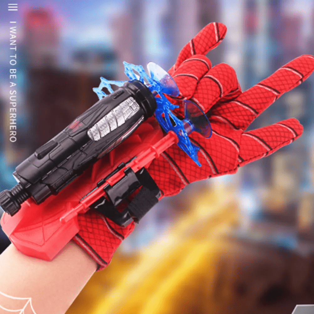 Close-up of the interactive web shooter toy glove's dart launching mechanism and adjustable strap for kids' play.