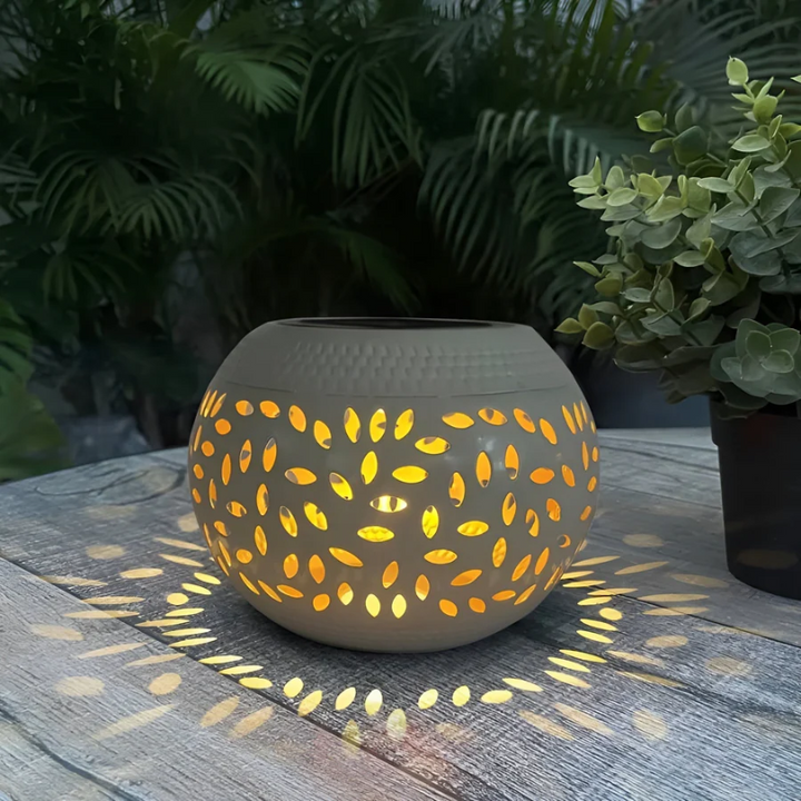 Weather-resistant outdoor solar pathway lights with a decorative metal lantern design, automatic & energy-efficient.