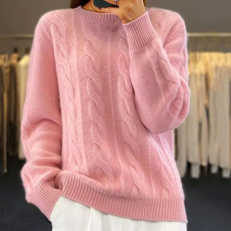 Stylish women's chunky knit sweater, ideal for comfortable fall fashion & cold winter days.