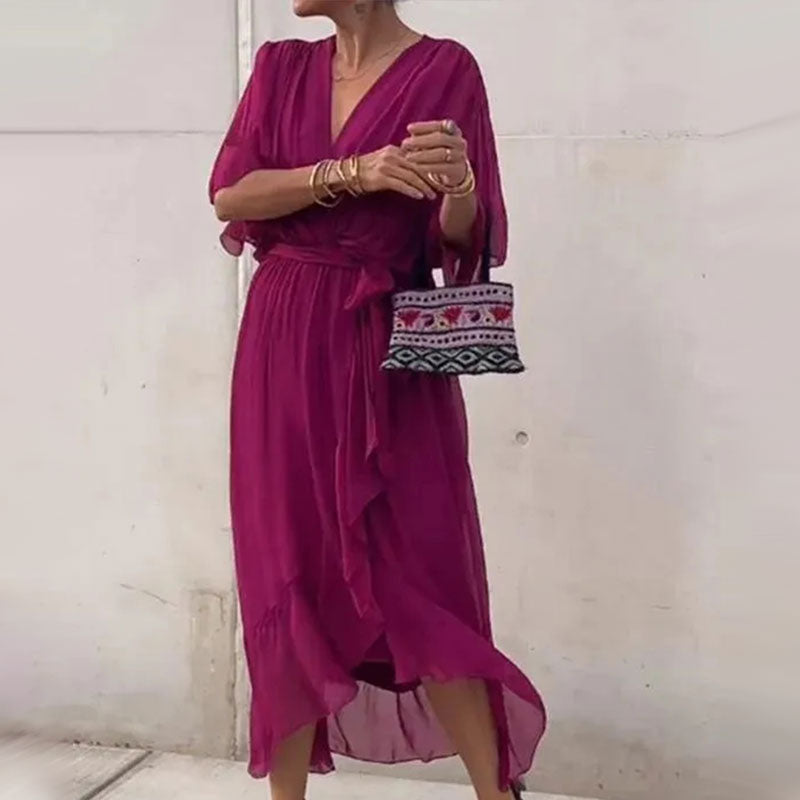 Comfortable & chic plus-size women's flowy V-neck midi dress with half sleeves, perfect for summer and party wear.