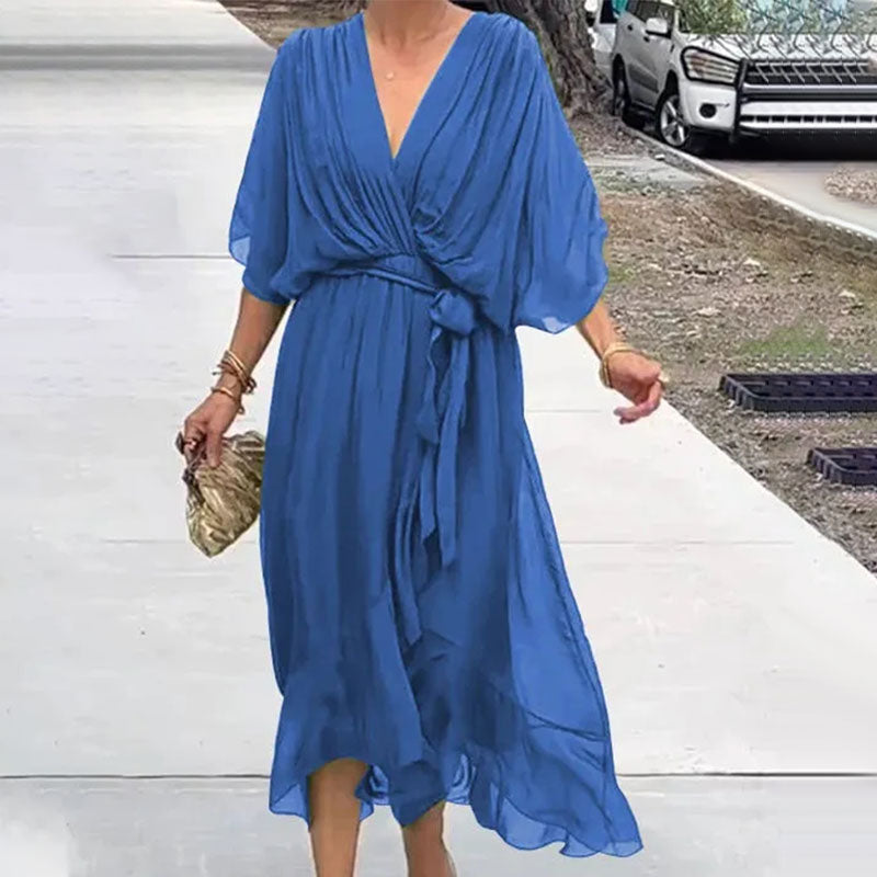Versatile plus-size women's elegant flowy V-neck midi dress, flattering fit for any occasion, midi length.