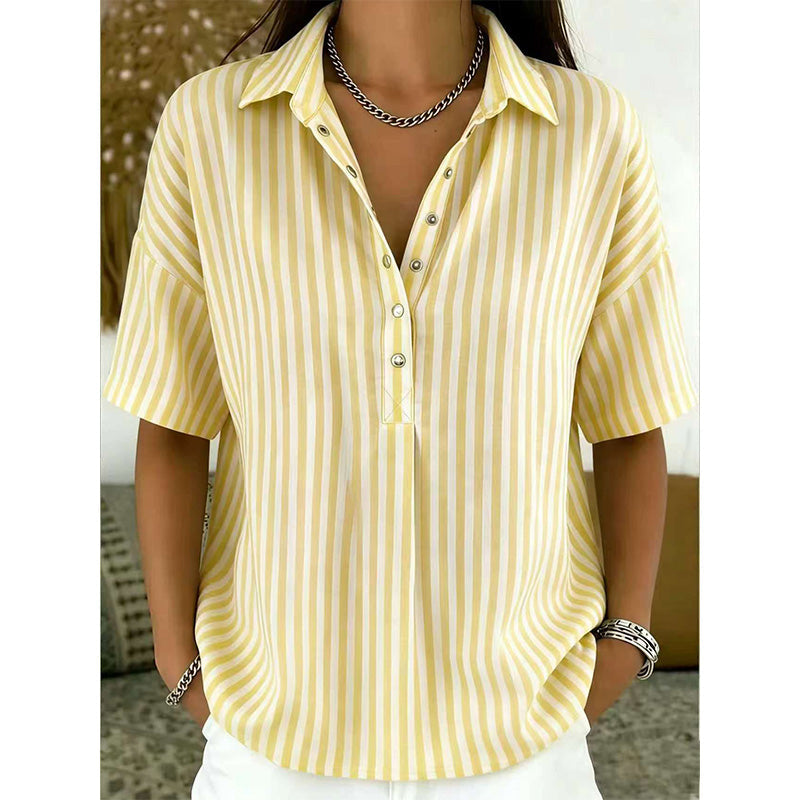 Close-up: Detail of striped pattern on women's V-neck short-sleeve top for elegant style.