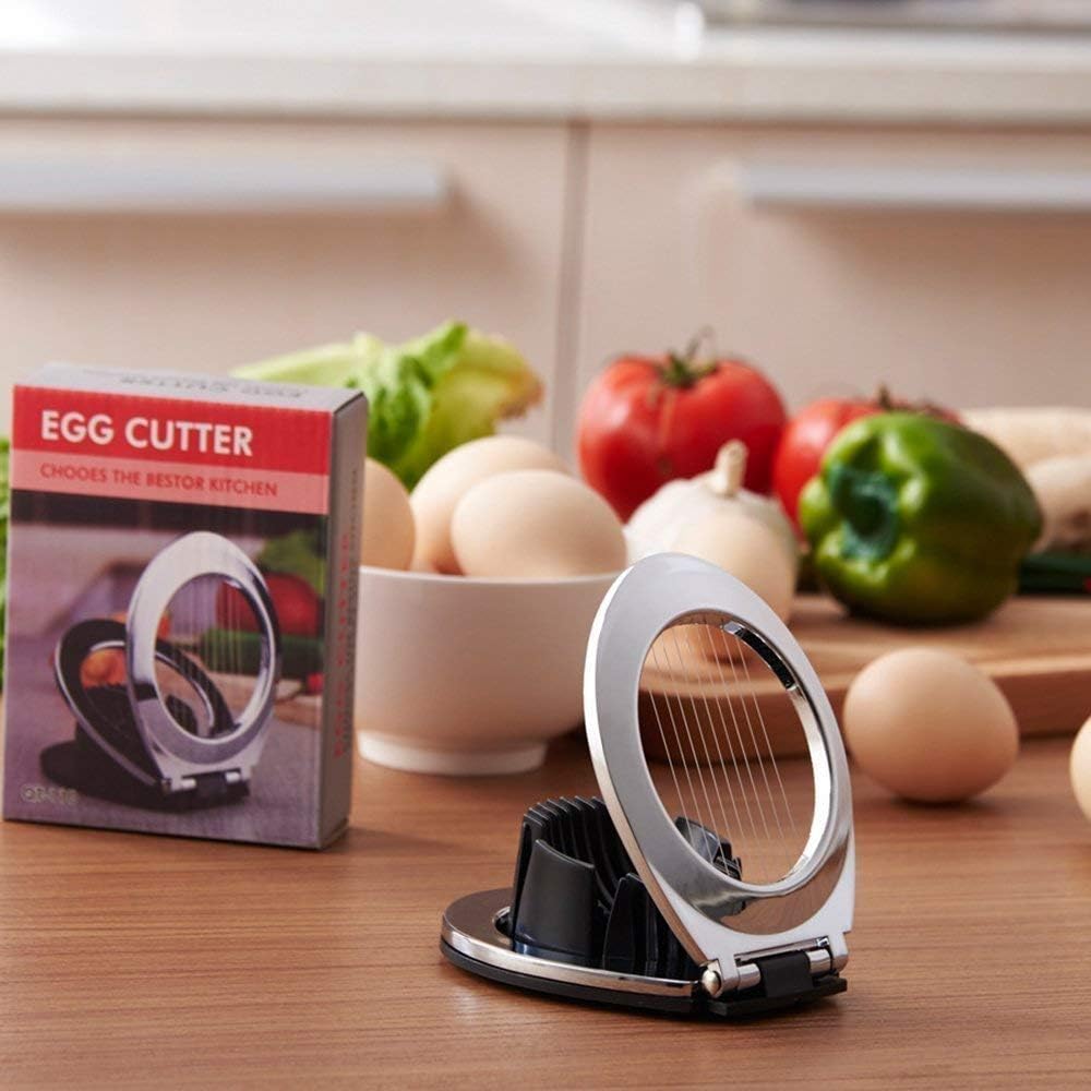 Achieve professional-looking food prep with this stainless steel egg slicer. Fast & easy for any kitchen.