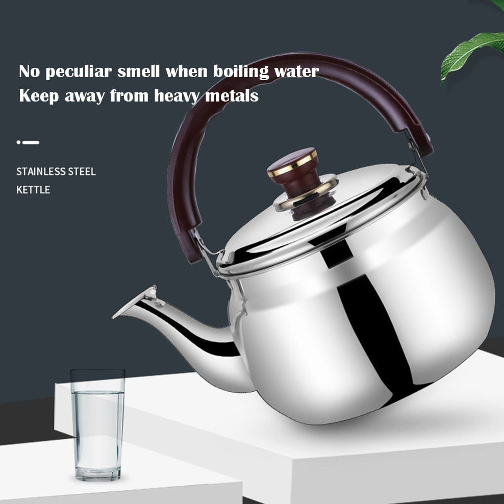 Polished stainless steel whistling stove top kettle with ergonomic handle for boiling water.
