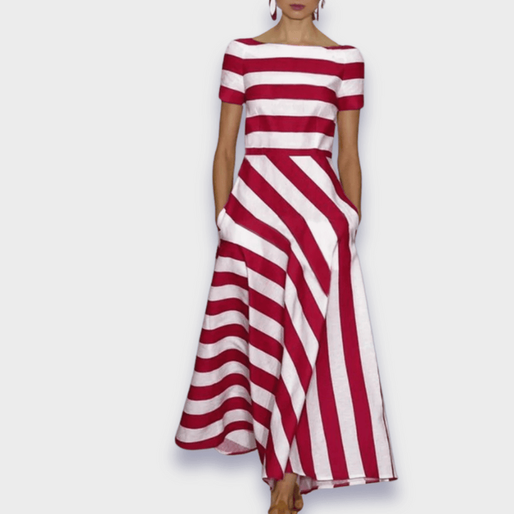 Women's striped A-line midi dress with pockets, perfect for elegant casual summer fashion. Flattering fit, versatile style.