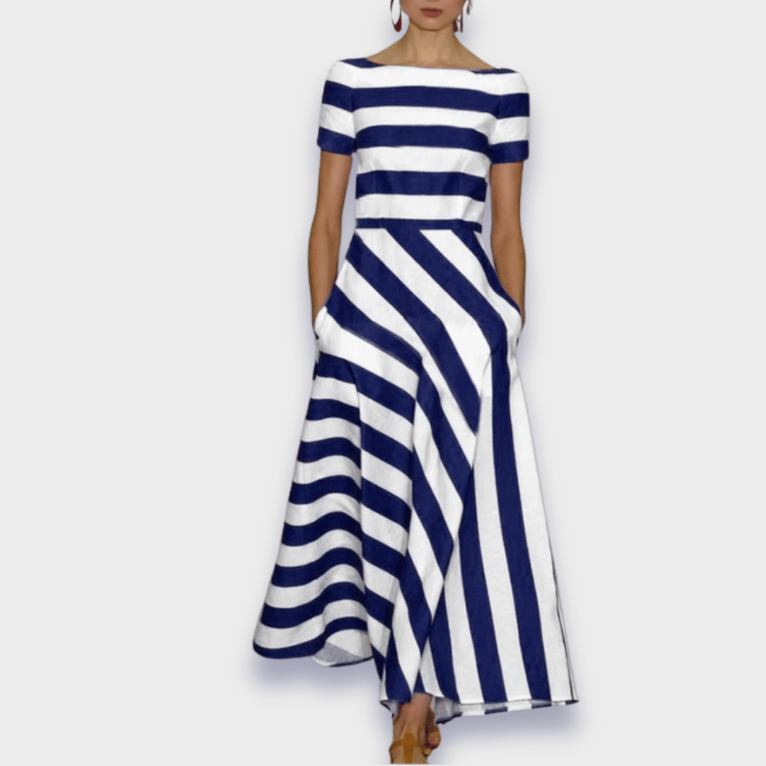 Stylish women's striped A-line midi dress. Perfect summer dress with pockets, offering a flattering fit for effortless wear.