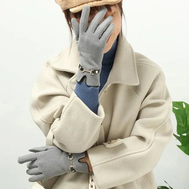Stylish women's autumn gloves. A warm fashion accessory, perfect for chilly winter days and comfort.