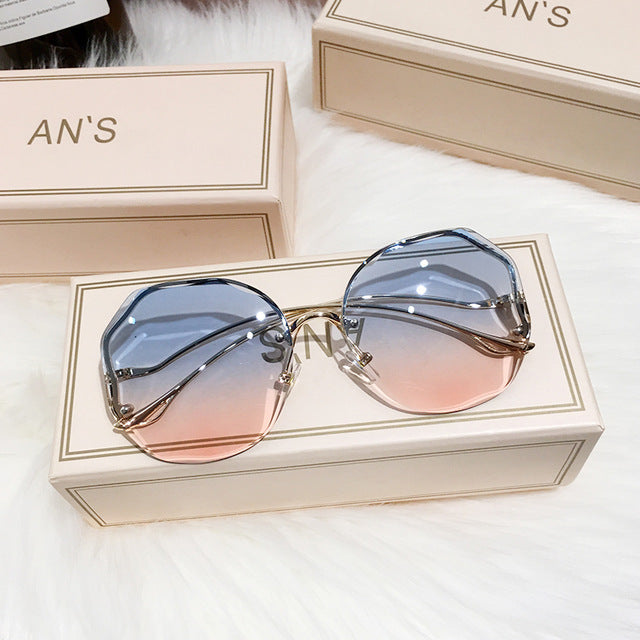 Women's stylish boho ombre sunglasses with gradient lenses for chic summer fashion & UV protection.