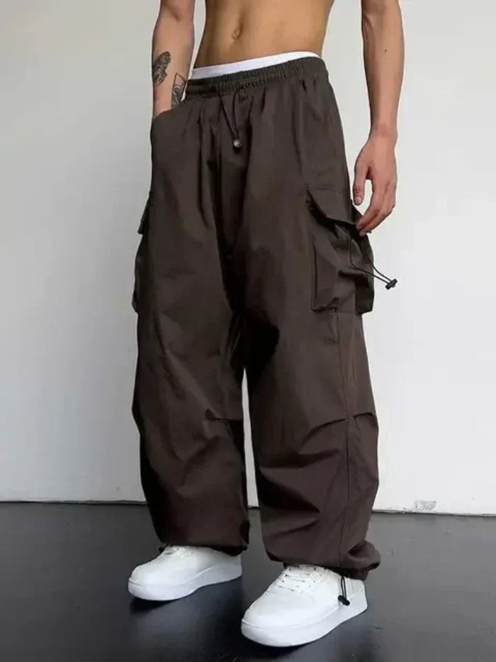 Stylish men's cargo pants in a versatile shade, perfect for casual wear, outdoor activities, and everyday comfort.