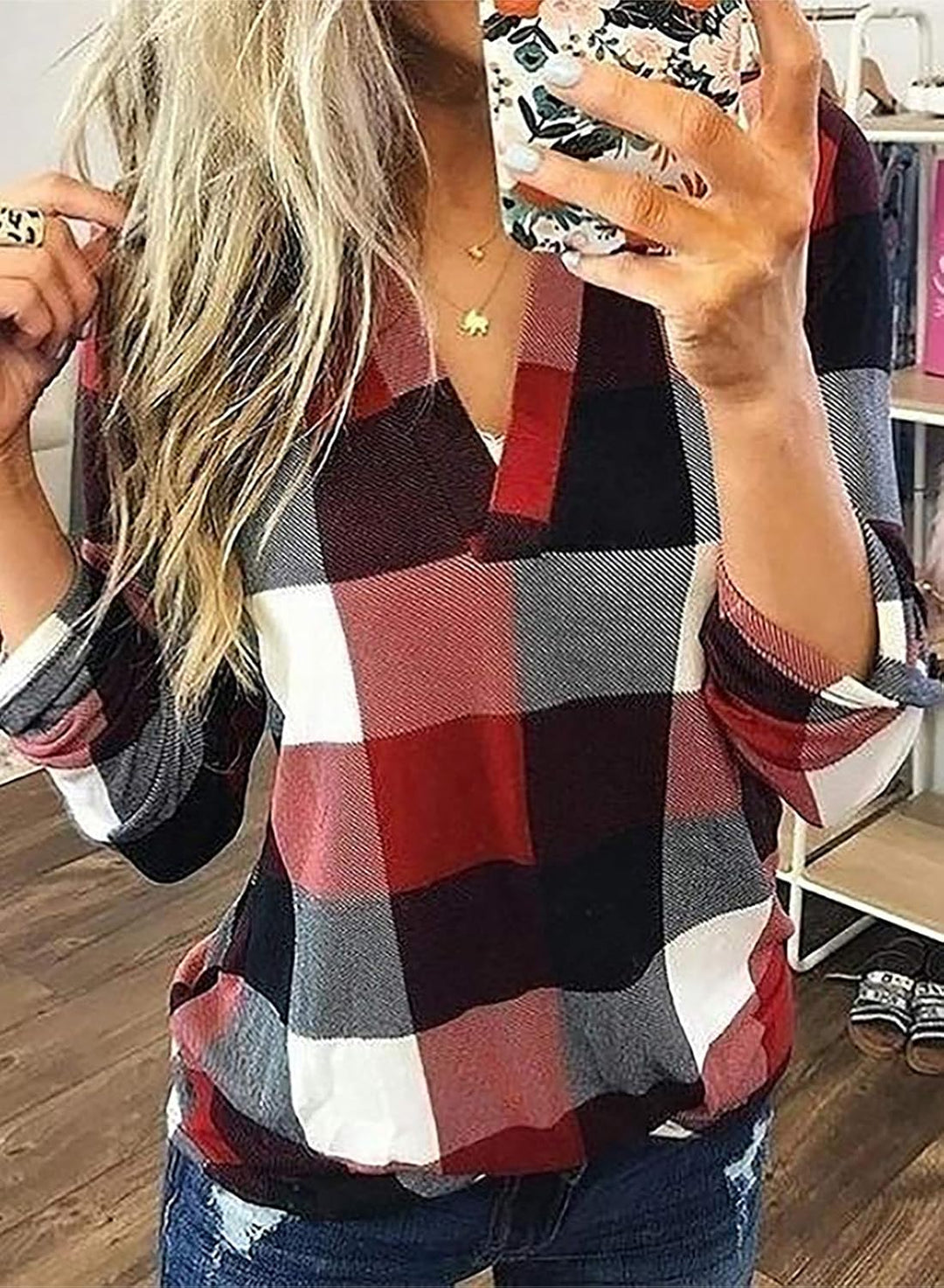Casual checked print women's top, offering comfort and style for everyday wear.