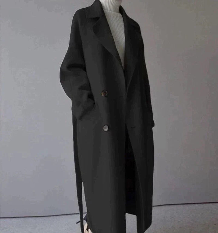 Stylish black women's long winter coat, warm and elegant outerwear. Perfect for fall and winter fashion, office or casual.