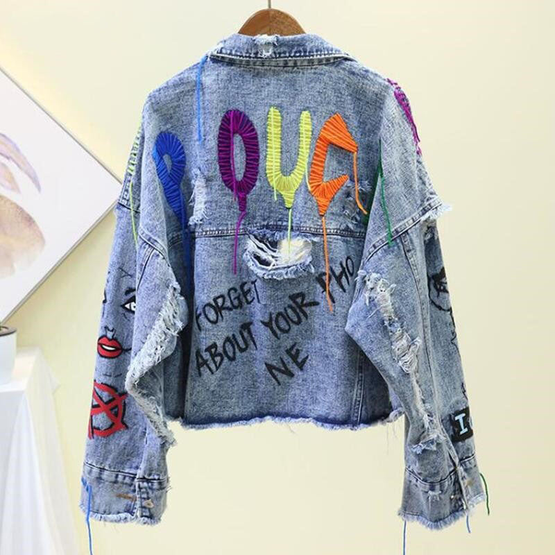 Versatile women's denim jacket with button-up front. Casual & stylish outerwear, great for spring/fall everyday wear.