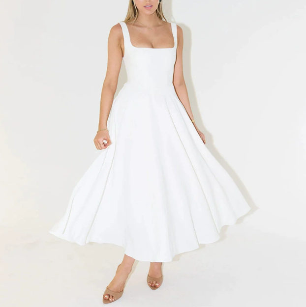 Elegant white floral midi dress for women, perfect for spring & summer occasions. Flattering and versatile.