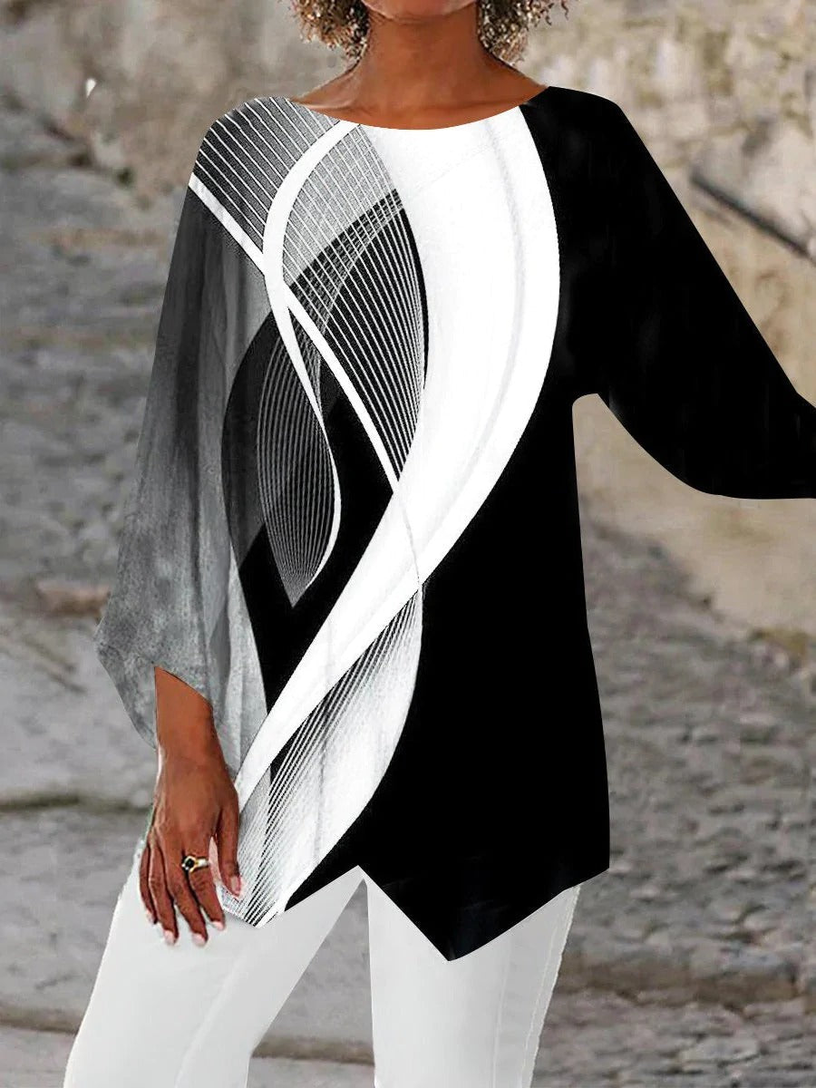 Comfortable women's geometric long sleeve tunic. Versatile black & white abstract style, perfect for casual or evening wear.