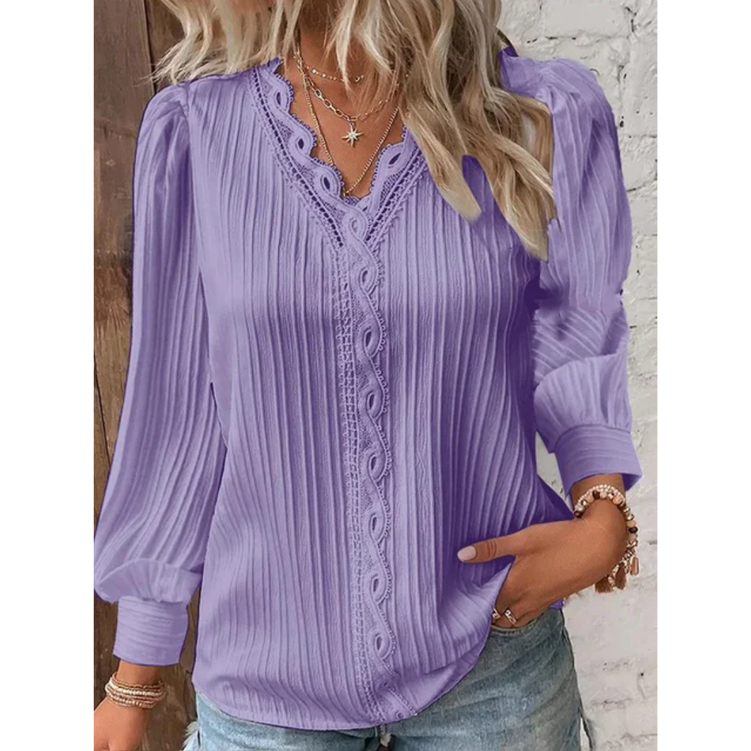 Women's long sleeve V-neck blouse. A versatile top for office or casual wear, a stylish everyday essential.