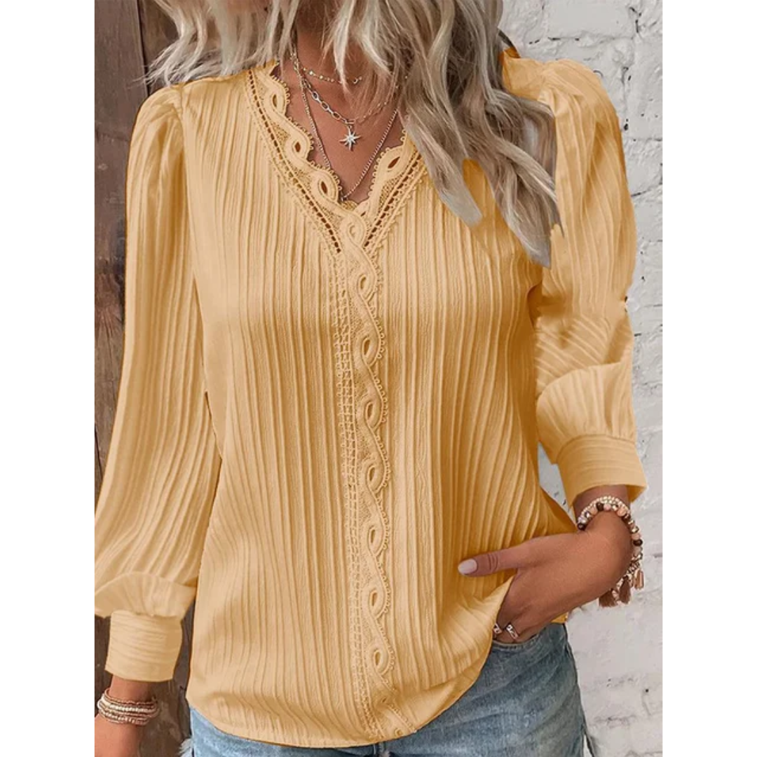 Comfortable women's V-neck long sleeve top, ideal for casual outfits & office wear. Versatile women's apparel.