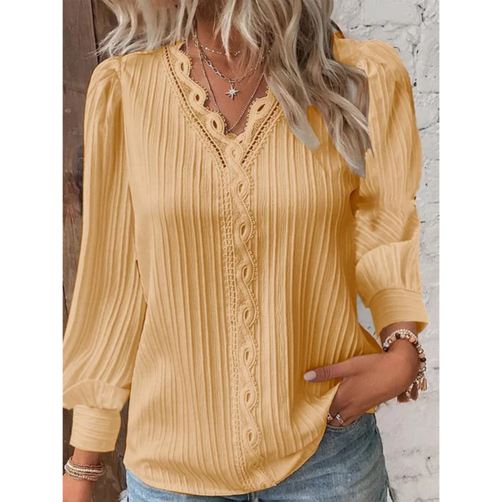 Comfortable women's V-neck long sleeve top, ideal for casual outfits & office wear. Versatile women's apparel.