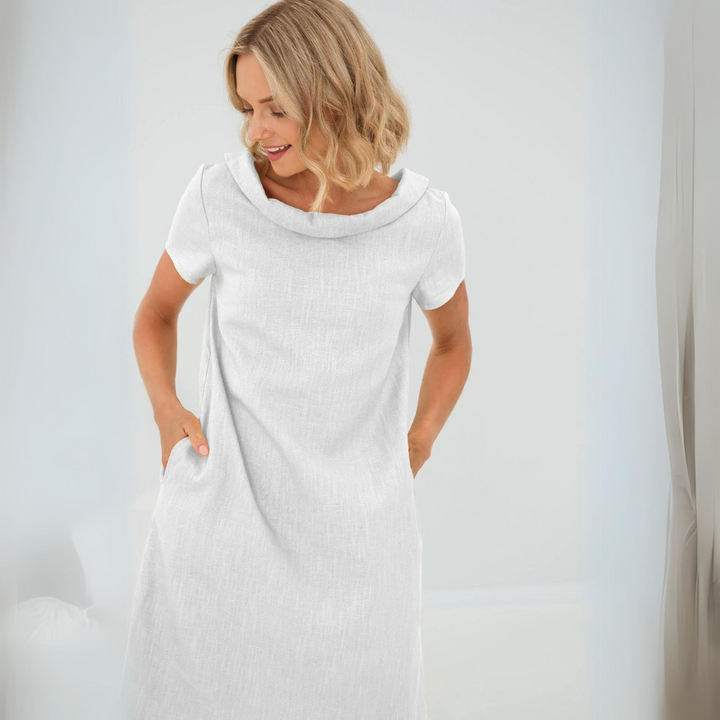 Short sleeve women's flowy dress with pockets, comfortable linen-cotton blend for casual summer fashion.