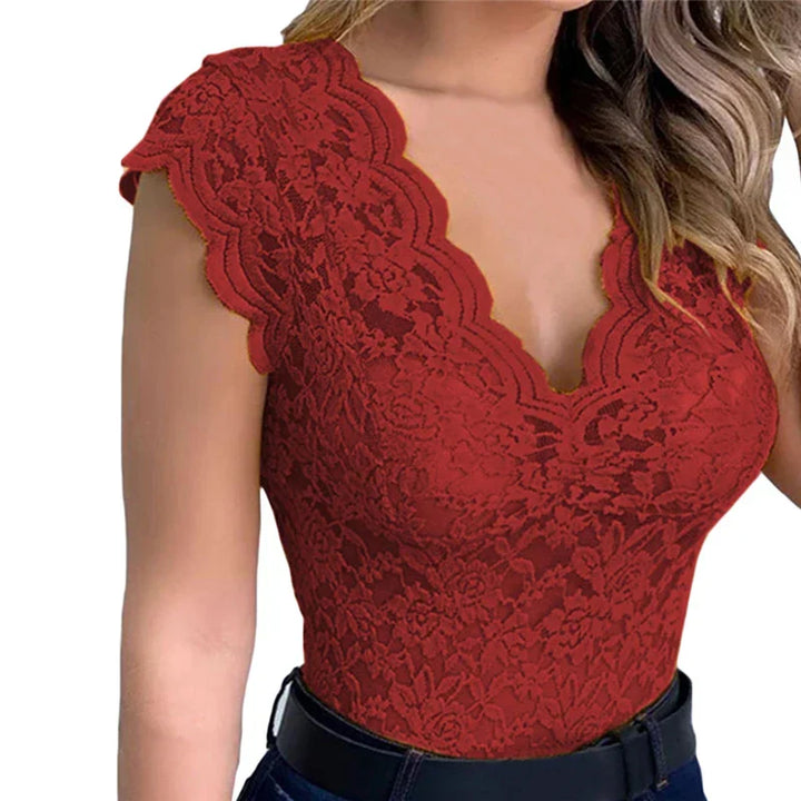 Versatile women's floral lace summer top, perfect for date night or warm weather casual wear. Elegant details.