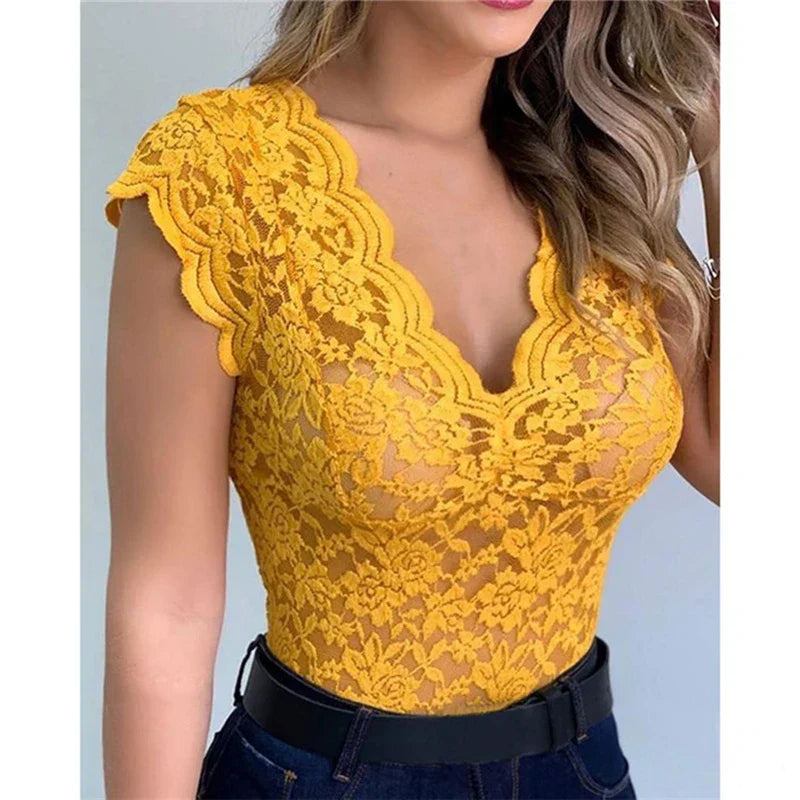Women's stylish floral lace summer top, airy & flattering, perfect for warm weather fashion.