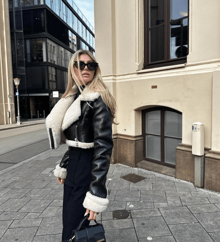 Elegant women's faux fur collar jacket, a chic and warm winter coat designed for cold weather fashion.
