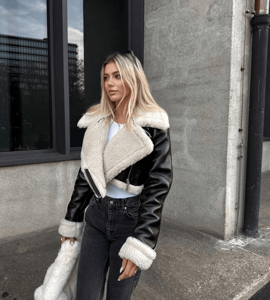 Sofia women's warm leather jacket featuring a luxurious faux fur collar; ideal for stylish cold weather outerwear.