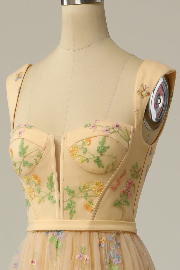 Detailed embroidery on a women's A-line ball gown, a stunning long formal evening dress.