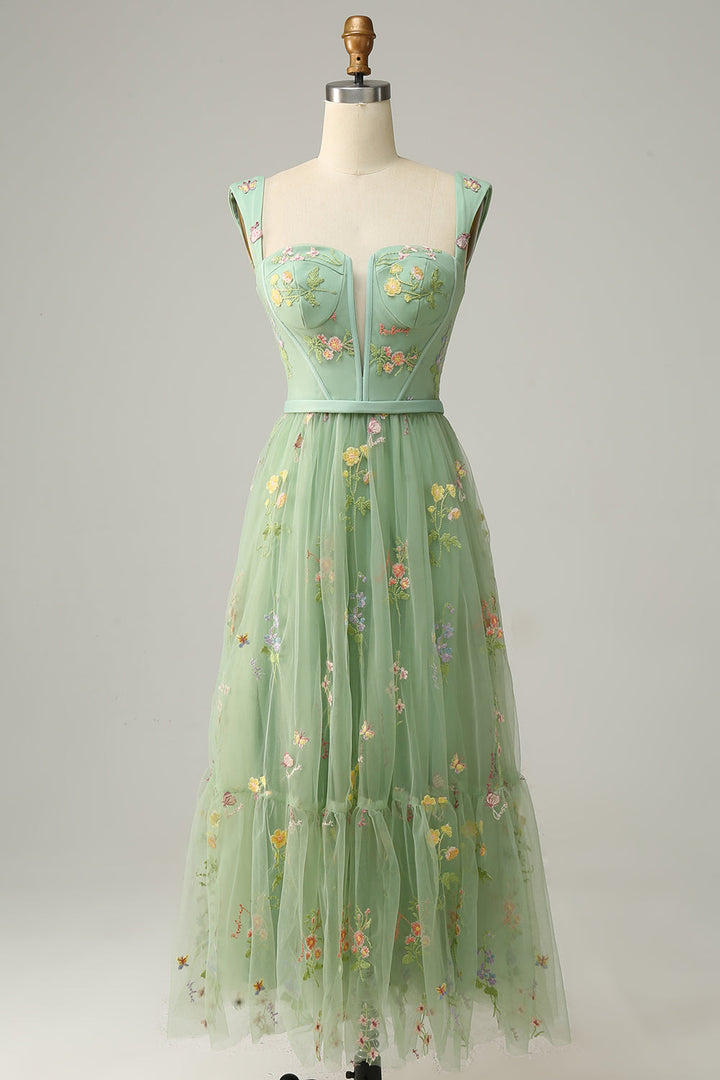 Women's stylish long A-line ball gown with elegant embroidery for formal events.