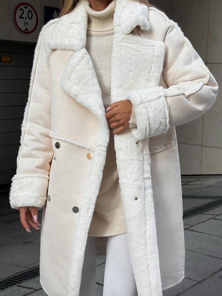Cozy grey Ava long polar fleece women's coat, a warm winter essential. Elegant outerwear for chic style & cold weather.