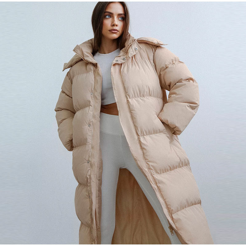 Cozy women's long puffer coat, Elise, designed for ultimate winter warmth. Stylish down jacket for cold weather.
