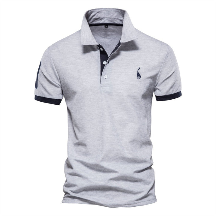 Men's classic striped polo shirt offering effortless style & comfort. Stylish short sleeve top for smart casual wear.