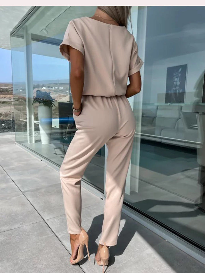 Modern women's wide leg jumpsuit, a comfortable and elegant V-neck design, perfect for fashion-forward style.