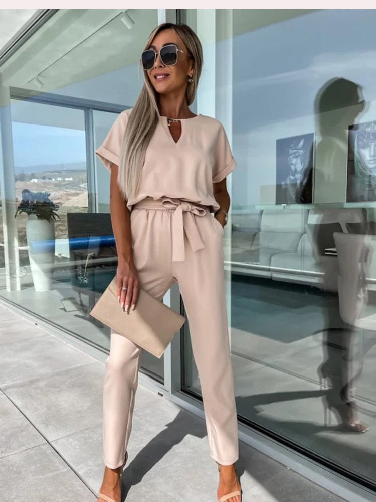 Comfortable women's wide leg jumpsuit, a versatile V-neck outfit for summer, casual, or evening elegance.