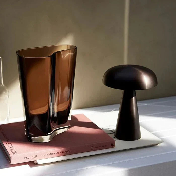 ShroomLite wireless LED table lamp, modern, portable, versatile lighting for any room.