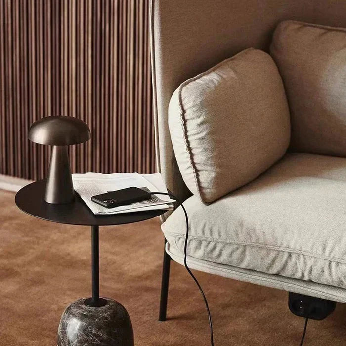 Stylish ShroomLite portable LED table lamp with a sleek gold finish for contemporary decor.