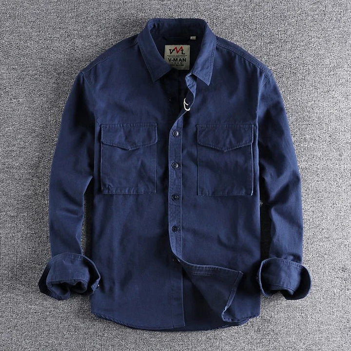 Stylish green men's utility shirt, a fashionable and comfortable choice for modern casual wear.
