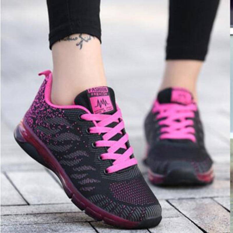 Stylish pink women's casual sneakers, perfect for everyday wear and comfortable walking.