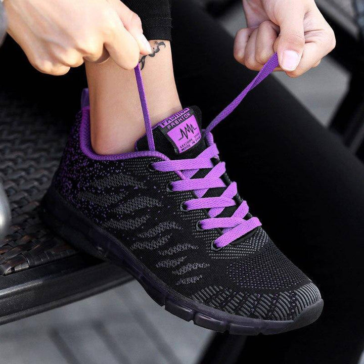 Stylish gray women's breathable sneakers, lightweight and perfect for versatile casual wear.
