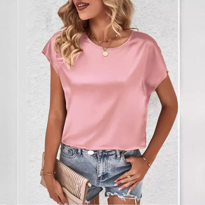 Versatile women's round neck batwing sleeve shirt, a stylish choice for summer and casual outings.