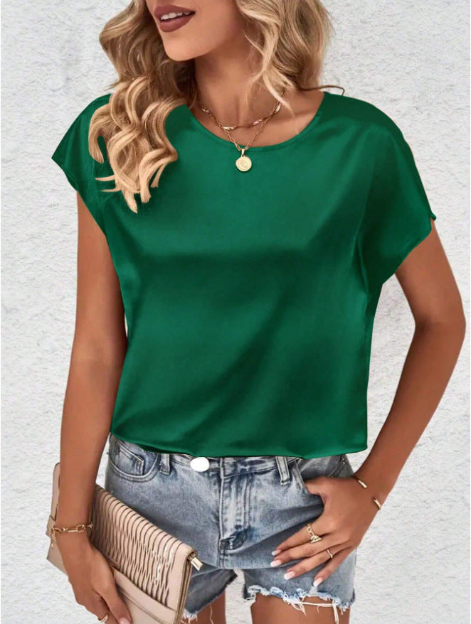 Stylish women's batwing top for spring/summer, offering a comfortable loose fit and elegant round neck.