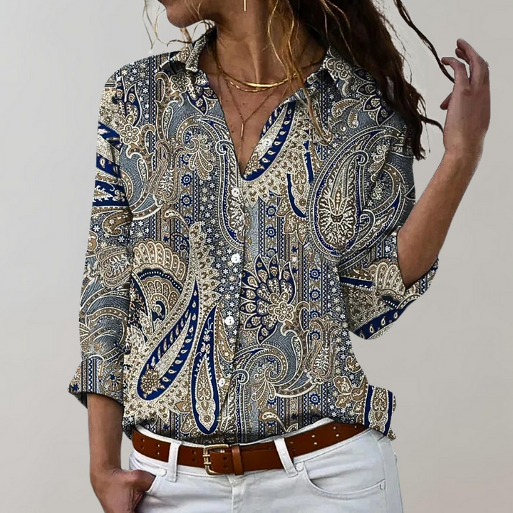 Elegant women's blouse with flattering fit, perfect for versatile day-to-night spring and summer fashion.