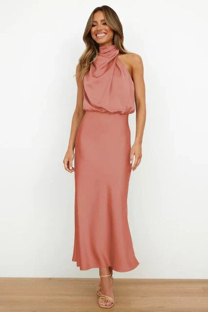 Women's sleeveless high-neck summer evening dress in satin, perfect for elegant formal events.