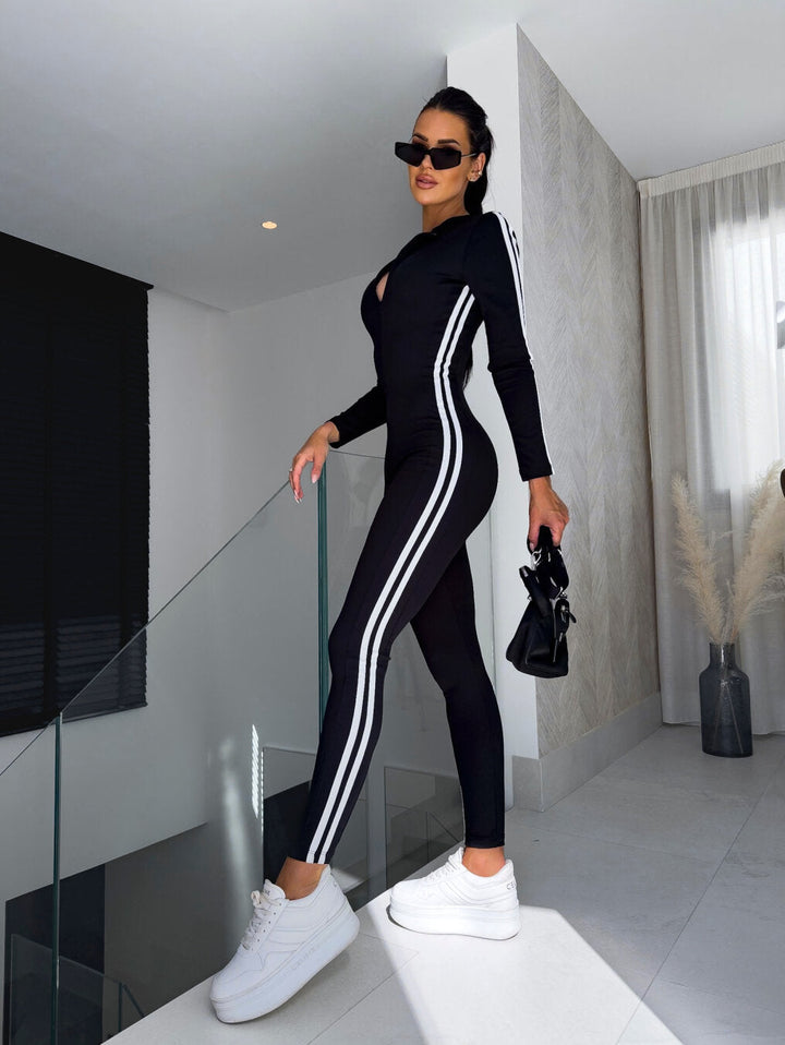 Women's chic striped zipper jumpsuit, long sleeve, elegant & versatile for modern fashion.