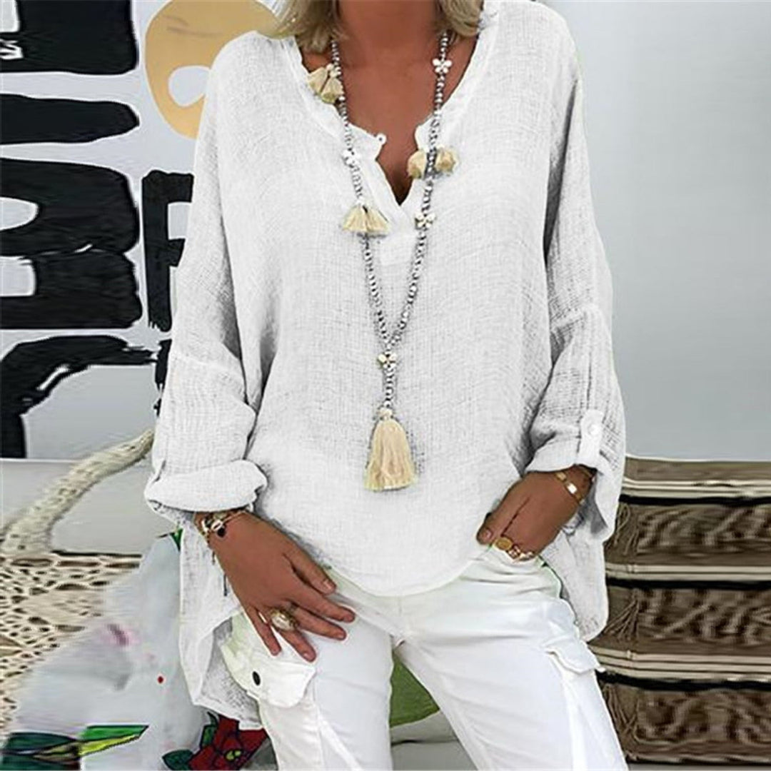 Chic Elodie women's linen shirt. Elegant long-sleeve blouse, versatile for day-to-night office or casual wear.