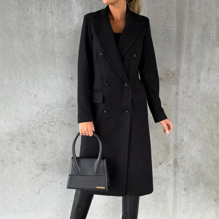 Long Elara Women's Winter Coat. Warm and stylish outerwear, essential for your cold weather winter wardrobe.