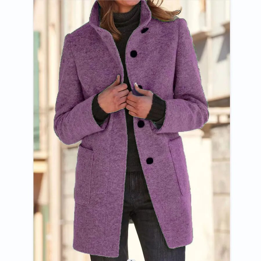 Elegant women's classic winter coat. Stylish buttoned overcoat for a sophisticated fall and winter look.