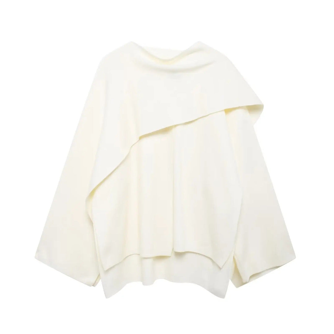 Women's warm poncho, an elegant layering piece for chic winter fashion & comfortable wear.